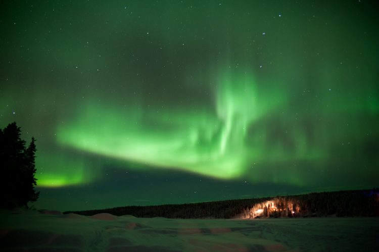 Northern lights dancing over Lapland