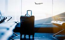 Airport departures suitcase in a waiting hall