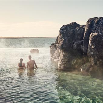 couple relaxing in the sky lagoon
