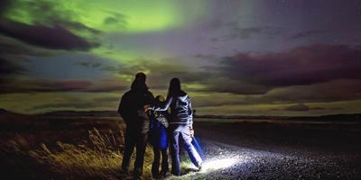 family watching the northern lights iceland?400x200;crop